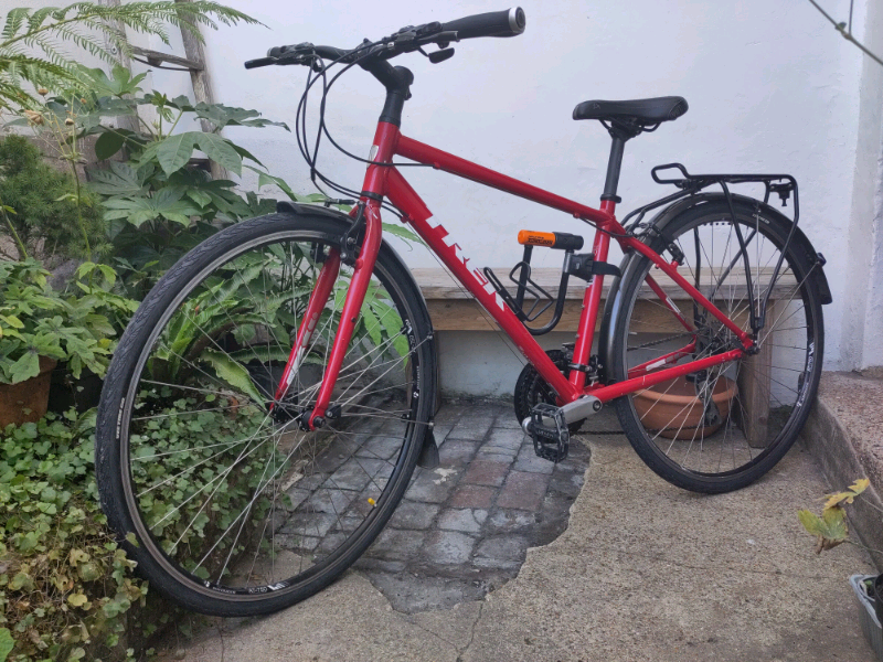 Red Trek 7.2 fx hybrid men/women's 